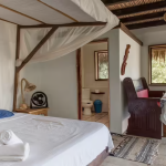 View to the bathroom with the door open